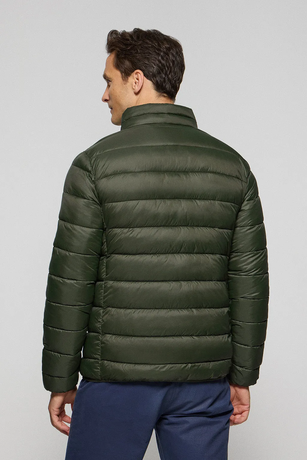 Chaqueta Chase ultralight verde oscuro con parche Rigby Go