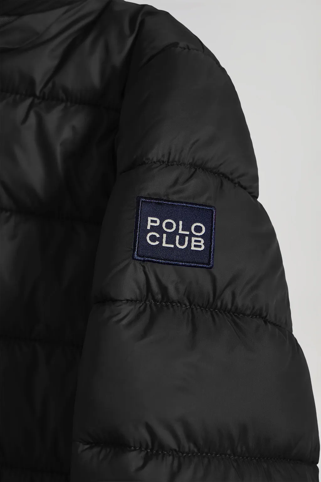 Chaqueta Coop ultralight de nio negra con detalles Polo Club