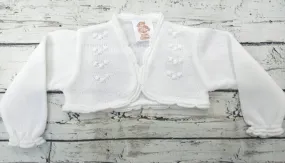 Chaqueta de niña blanca de perlé de Prim Baby.