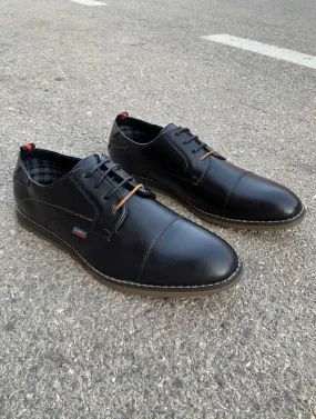 Zapato negro de vestir